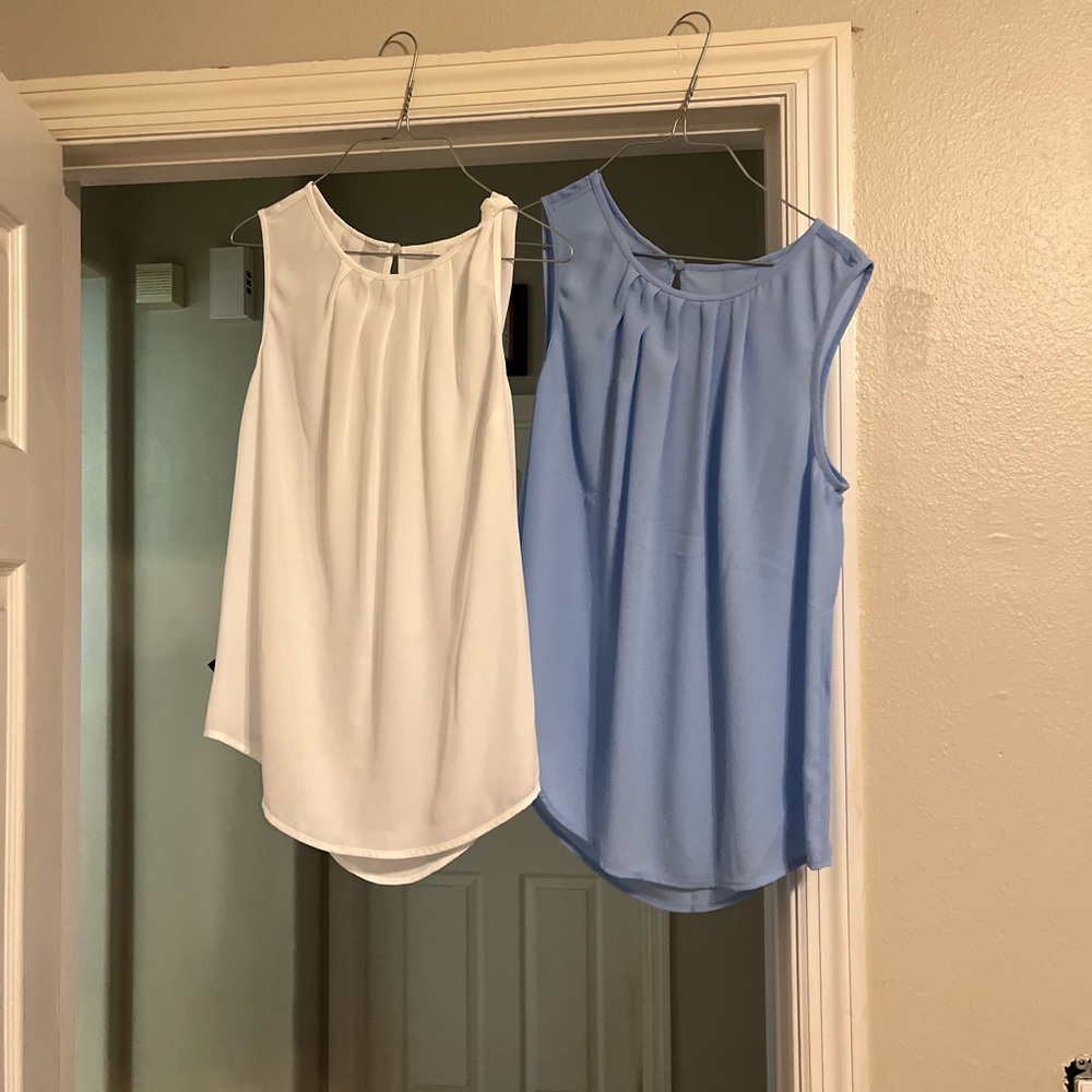 Woman’s shirts. $10 for each or both for $18